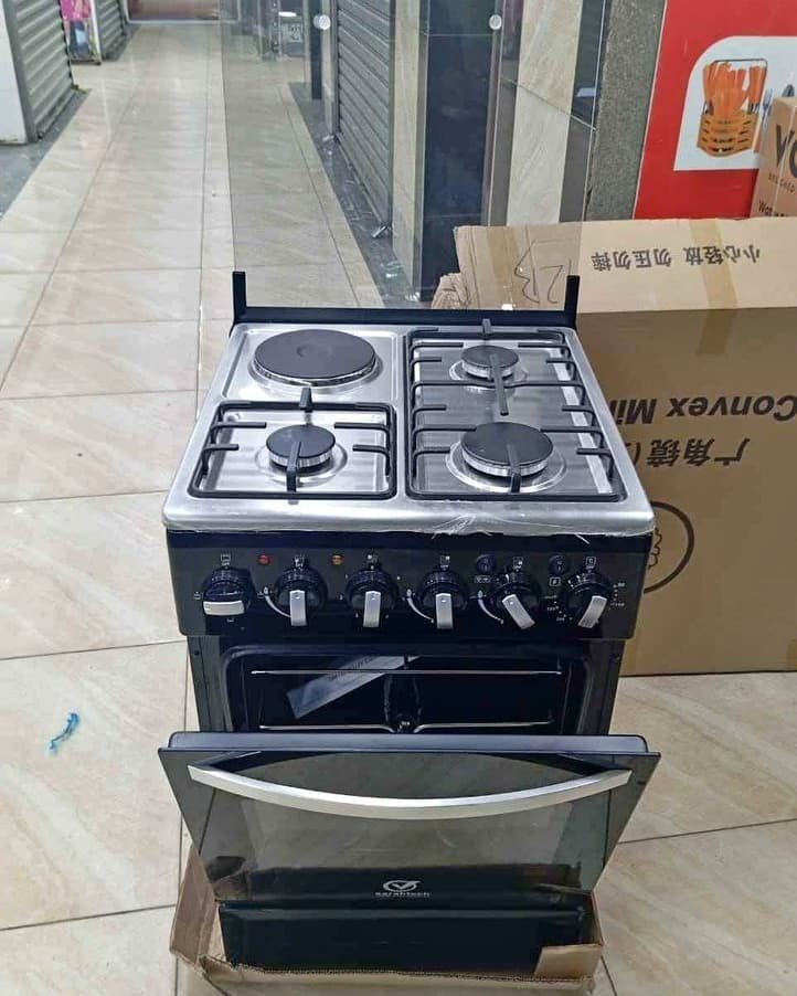 1000149265.jpg Saratech Standing Cooker 3 Gas, 1 Electric Hotplate, with Electric Oven, Auto-ignition technology - Image 1
